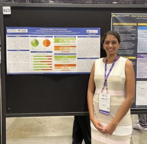 Sweatha Reddy with AAIC poster