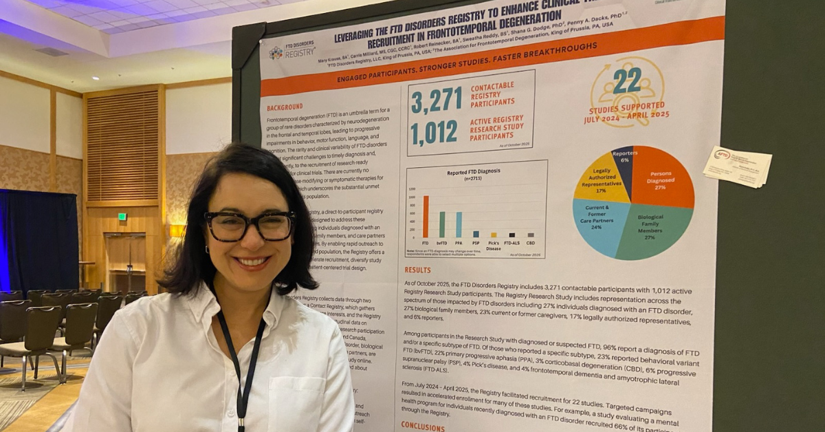 Shana Dodge in front of FTD Disorders Registry poster at CTAD